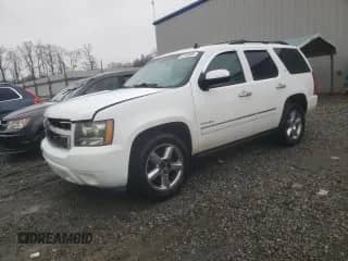 2012 Chevrolet Tahoe LTZ z VIN 1GNSCCE01CR111691, wystawiony jako Copart lot #42318045 z przebiegiem 192 622 mil mil oraz Szkoda całkowita • Salvage title. Historia ofert i sprzedaży dostępna na DreamBid. Obrazek 1.
