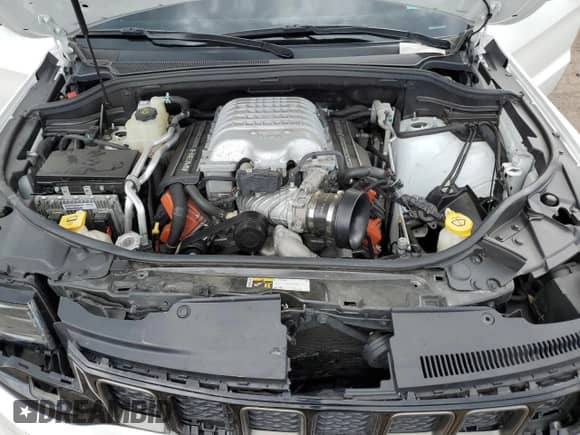 2020 Jeep Grand Cherokee Trackhawk с VIN 1C4RJFN90LC385190, выставлен на аукционе Copart как лот 68286714 с пробегом Не указан миль и Списание • Salvage title. История ставок и продаж доступна на DreamBid. Изображение 13.