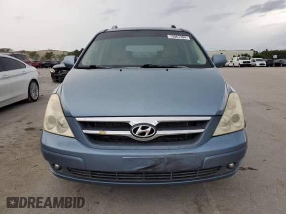 2007 Hyundai Entourage GLS with VIN KNDMC233376032281, listed as a Copart auction lot 73967304 with 252,331 mi miles and Salvage title. Bid and sale history available at DreamBid. Image 5.