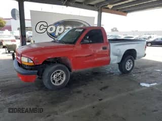 2001 Dodge Dakota with VIN 1B7GG26X21S272212, listed as a Copart auction lot 60561015 with 94,900 mi miles and Salvage title. Bid and sale history available at DreamBid. Image 1.