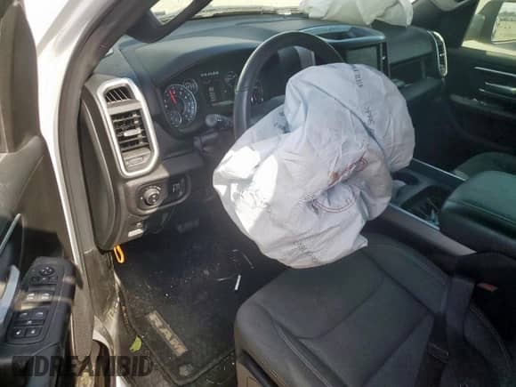 2023 Ram 1500 Lone Star with VIN 1C6SRFFT1PN692860, listed as a Copart auction lot 67404305 with 57,407 mi miles and Salvage title. Bid and sale history available at DreamBid. Image 8.