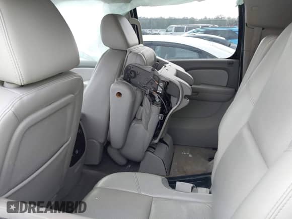 2009 Chevrolet Suburban LTZ z VIN 1GNFK36359R256609, wystawiony jako IAAI lot #42799458 z przebiegiem 146 257 mil mil oraz . Historia ofert i sprzedaży dostępna na DreamBid. Obrazek 8.