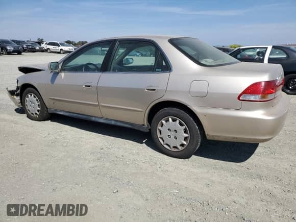 2002 Honda Accord LX with VIN 3HGCG66542G702157, listed as a Copart auction lot 71296125 with 129,653 mi miles and Salvage title. Bid and sale history available at DreamBid. Image 2.