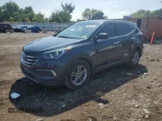 2018 Hyundai Santa Fe 2.4L with VIN 5NMZT3LB3JH052933, listed as a Copart auction lot 70067435 with 140,758 mi miles and Salvage title. Bid and sale history available at DreamBid. Image 1.