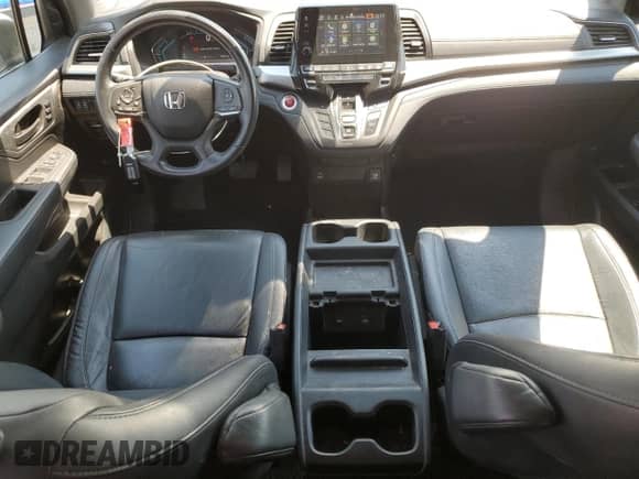 2021 Honda Odyssey EX-L с VIN 5FNRL6H73MB033715, выставлен на аукционе Copart как лот 68783355 с пробегом 78 574 миль миль и Списание • Salvage title. История ставок и продаж доступна на DreamBid. Изображение 8.