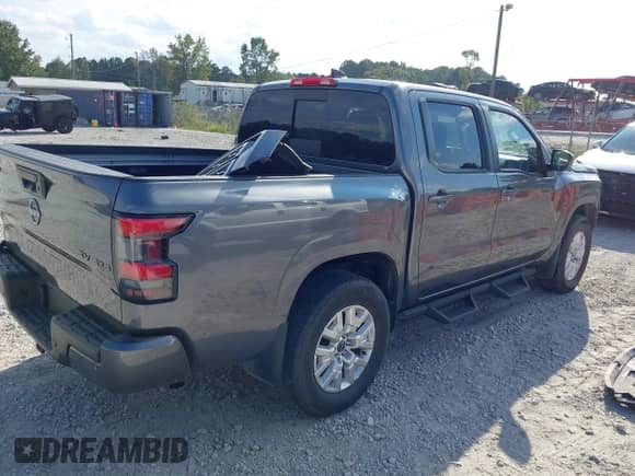 2023 Nissan Frontier S with VIN 1N6ED1EK2PN600197, listed as a IAAI auction lot 43227528 with 40,667 mi miles and . Bid and sale history available at DreamBid. Image 4.