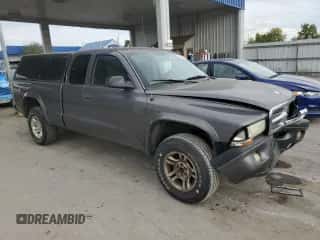 2004 Dodge Dakota with VIN 1D7HG32K24S651547, listed as a Copart auction lot 80031045 with 157,257 mi miles and Salvage title. Bid and sale history available at DreamBid. Image 4.