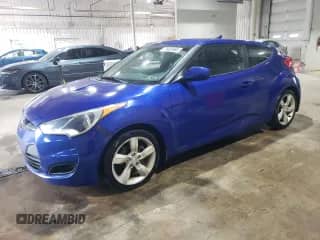 2012 Hyundai Veloster w/Black Int z VIN KMHTC6AD3CU078659, wystawiony jako Copart lot #71902465 z przebiegiem 130 632 mil mil oraz Szkoda całkowita • Salvage title. Historia ofert i sprzedaży dostępna na DreamBid. Obrazek 1.