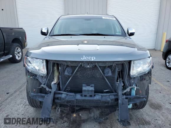 2012 Jeep Grand Cherokee Limited z VIN 1C4RJFBT3CC246526, wystawiony jako Copart lot #74776133 z przebiegiem 162 805 mil mil oraz Szkoda całkowita • Salvage title. Historia ofert i sprzedaży dostępna na DreamBid. Obrazek 5.