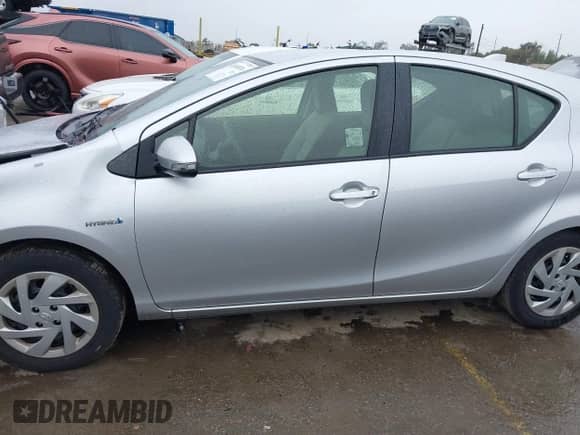 2015 Toyota Prius One z VIN JTDKDTB35F1575641, wystawiony jako IAAI lot #41803870 z przebiegiem 129 286 mil mil oraz . Historia ofert i sprzedaży dostępna na DreamBid. Obrazek 14.