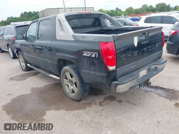 2003 Chevrolet Avalanche with VIN 3GNEK13T93G258228, listed as a IAAI auction lot 42751160 with 255,292 mi miles and . Bid and sale history available at DreamBid. Image 3.