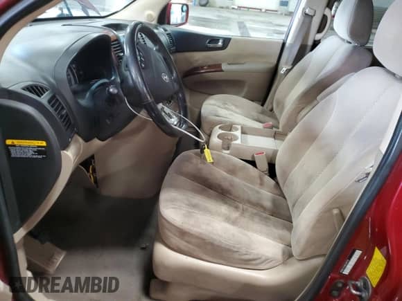 2008 Hyundai Entourage GLS с VIN KNDMC233186046729, выставлен на аукционе Copart как лот 76093674 с пробегом 184 272 миль миль и Списание • Salvage title. История ставок и продаж доступна на DreamBid. Изображение 7.