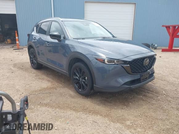 2022 Mazda CX-5 S Preferred z VIN JM3KFBCM8N1581273, wystawiony jako IAAI lot #42568772 z przebiegiem 23 557 mil mil oraz . Historia ofert i sprzedaży dostępna na DreamBid. Obrazek 1.