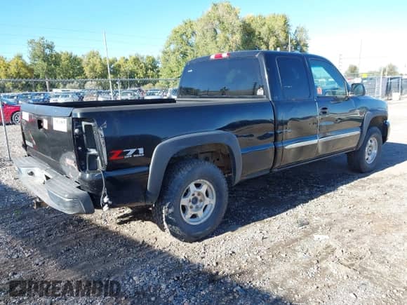 2004 GMC Sierra 1500 SLE z VIN 1GTEK19T34E266737, wystawiony jako IAAI lot #43369214 z przebiegiem 211 373 mil mil oraz . Historia ofert i sprzedaży dostępna na DreamBid. Obrazek 4.