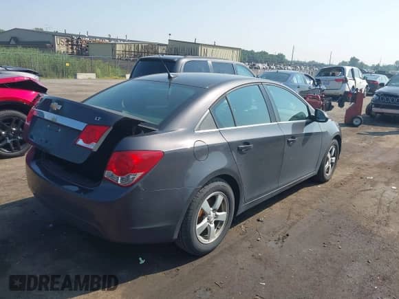 2014 Chevrolet Cruze 1LT с VIN 1G1PC5SB2E7182194, выставлен на аукционе IAAI как лот 42993632 с пробегом 184 775 миль миль и . История ставок и продаж доступна на DreamBid. Изображение 4.