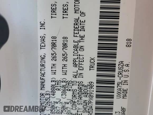 2023 Toyota Tundra SR5 with VIN 5TFLA5DA7PX091909, listed as a Copart auction lot 65140335 with 41,553 mi miles and Salvage title. Bid and sale history available at DreamBid. Image 12.