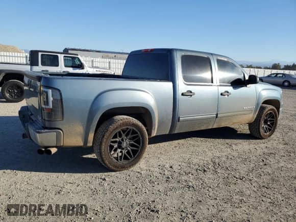 2007 GMC Sierra 1500 SLT z VIN 2GTEC13J671534478, wystawiony jako Copart lot #87047235 z przebiegiem 233 555 mil mil oraz Czysty tytuł • Clean title. Historia ofert i sprzedaży dostępna na DreamBid. Obrazek 3.
