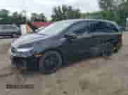 2025 Honda Odyssey Sport-L z VIN 5FNRL6H71SB057590, wystawiony jako Copart lot #65234495 z przebiegiem 4 156 mil mil oraz Nie do naprawy • Non repairable. Historia ofert i sprzedaży dostępna na DreamBid. Obrazek 1.