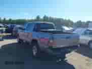 2015 Toyota Tacoma with VIN 3TMLU4EN1FM197831, listed as a IAAI auction lot 43233901 with 123,905 mi miles and . Bid and sale history available at DreamBid. Image 3.