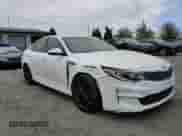 2016 Kia Optima EX z VIN 5XXGU4L3XGG040921, wystawiony jako Copart lot #71680955 z przebiegiem 119 538 mil mil oraz Szkoda całkowita • Salvage title. Historia ofert i sprzedaży dostępna na DreamBid. Obrazek 13.