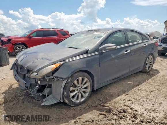 2012 Hyundai Sonata Limited с VIN 5NPEC4AB0CH396524, выставлен на аукционе Copart как лот 69050765 с пробегом 218 134 миль миль и Списание • Salvage title. История ставок и продаж доступна на DreamBid. Изображение 1.