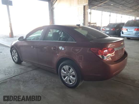 2012 Chevrolet Cruze LS z VIN 1G1PC5SH3C7209193, wystawiony jako Copart lot #71026585 z przebiegiem 52 921 mil mil oraz Szkoda całkowita • Salvage title. Historia ofert i sprzedaży dostępna na DreamBid. Obrazek 2.