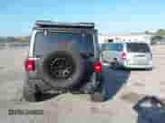 2021 Jeep Wrangler Unlimited Sahara High Altitude with VIN 1C4HJXEM8MW670290, listed as a IAAI auction lot 41547689 with 21,862 mi miles and . Bid and sale history available at DreamBid. Image 16.