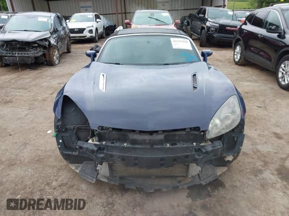 2009 Saturn Sky Red Line with VIN 1G8MT35X09Y105064, listed as a IAAI auction lot 42197028 with 106,673 mi miles and . Bid and sale history available at DreamBid. Image 12.