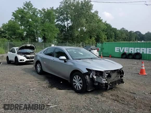 2019 Toyota Camry Hybrid LE с VIN 4T1B31HK5KU006427, выставлен на аукционе Copart как лот 67635565 с пробегом 35 889 миль миль и Списание • Salvage title. История ставок и продаж доступна на DreamBid. Изображение 14.