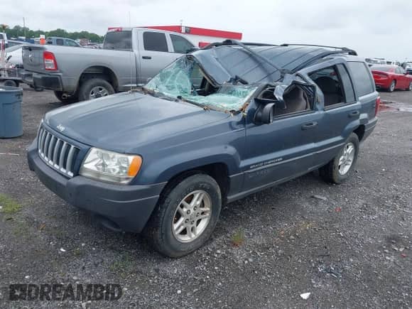 2004 Jeep Grand Cherokee Laredo with VIN 1J4GX48S34C213420, listed as a IAAI auction lot 42221769 with 194,163 mi miles and . Bid and sale history available at DreamBid. Image 2.