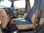 2001 Jeep Wrangler Sahara с VIN 1J4FA59S31P372167, выставлен на аукционе Copart как лот 65828905 с пробегом 170 902 миль миль и Списание • Salvage title. История ставок и продаж доступна на DreamBid. Изображение 7.