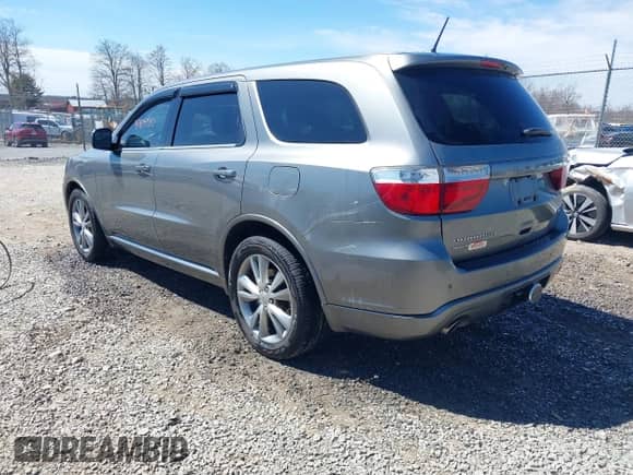 2011 Dodge Durango R/T with VIN 1D4SE6GT1BC712311, listed as a IAAI auction lot 41905530 with 149,940 mi miles and . Bid and sale history available at DreamBid. Image 3.