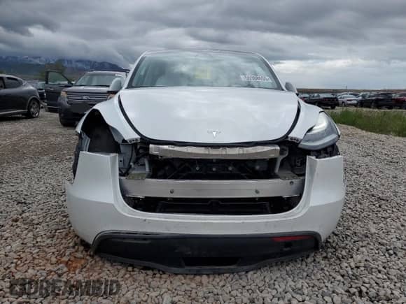 2023 Tesla Model Y Long Range с VIN 7SAYGAEE9PF584339, выставлен на аукционе Copart как лот 56988655 с пробегом Не указан миль и Списание • Salvage title. История ставок и продаж доступна на DreamBid. Изображение 5.
