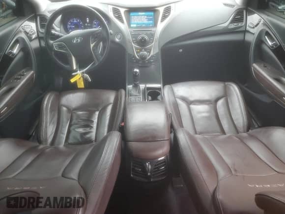 2013 Hyundai Azera с VIN KMHFH4JG0DA323501, выставлен на аукционе Copart как лот 84069634 с пробегом 96 296 миль миль и Списание • Salvage title. История ставок и продаж доступна на DreamBid. Изображение 8.