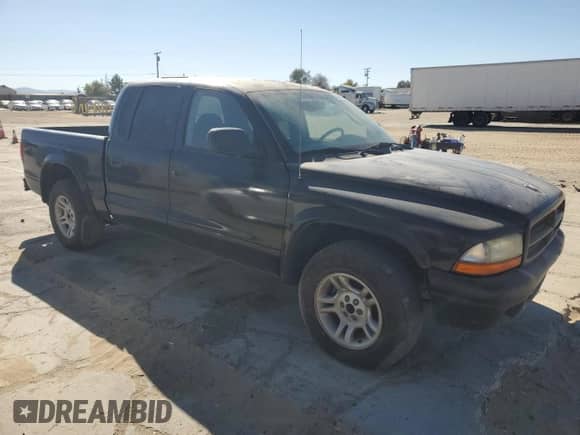 2003 Dodge Dakota Sport z VIN 1D7HL38N03S172331, wystawiony jako Copart lot #78851764 z przebiegiem 162 521 mil mil oraz Czysty tytuł • Clean title. Historia ofert i sprzedaży dostępna na DreamBid. Obrazek 4.