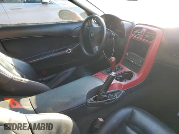 2006 Chevrolet Corvette with VIN 1G1YY25U465130371, listed as a Copart auction lot 72129034 with Not provided miles and Salvage title. Bid and sale history available at DreamBid. Image 8.