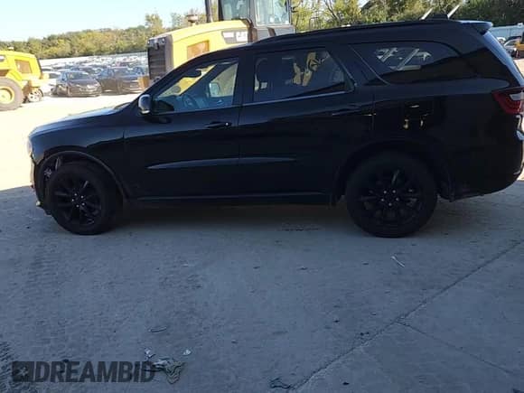 2018 Dodge Durango GT z VIN 1C4RDJDG9JC115835, wystawiony jako Copart lot #71180495 z przebiegiem 116 551 mil mil oraz Nie do naprawy • Non repairable. Historia ofert i sprzedaży dostępna na DreamBid. Obrazek 14.