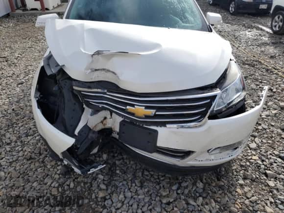 2014 Chevrolet Traverse LTZ z VIN 1GNKVJKD9EJ273673, wystawiony jako Copart lot #82049405 z przebiegiem 88 870 mil mil oraz Nie do naprawy • Non repairable. Historia ofert i sprzedaży dostępna na DreamBid. Obrazek 12.