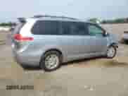2014 Toyota Sienna XLE with VIN 5TDYK3DCXES426267, listed as a Copart auction lot 81193765 with 142,543 mi miles and Salvage title. Bid and sale history available at DreamBid. Image 3.