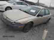 1999 Saturn SL with VIN 1G8ZH5282XZ273375, listed as a IAAI auction lot 41787290 with 230,397 mi miles and . Bid and sale history available at DreamBid. Image 2.