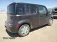 2010 Nissan Cube SL с VIN JN8AZ2KR6AT161359, выставлен на аукционе Copart как лот 68426485 с пробегом 158 310 миль миль и Списание • Salvage title. История ставок и продаж доступна на DreamBid. Изображение 3.