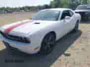 2013 Dodge Challenger SXT with VIN 2C3CDYAG3DH520016, listed as a IAAI auction lot 42117942 with 150,463 mi miles and . Bid and sale history available at DreamBid. Image 18.