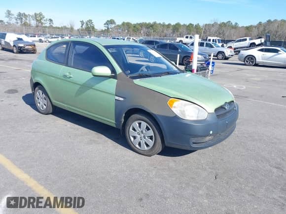 2010 Hyundai Accent Blue z VIN KMHCM3ACXAU160386, wystawiony jako IAAI lot #41451798 z przebiegiem 124 966 mil mil oraz . Historia ofert i sprzedaży dostępna na DreamBid. Obrazek 1.