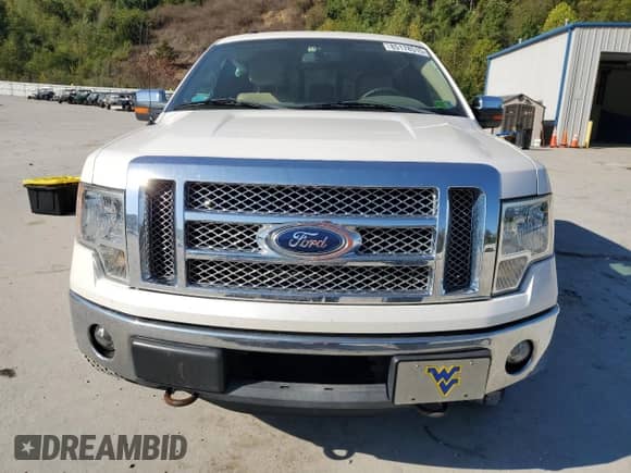2011 Ford F-150 Lariat с VIN 1FTFW1ET7BFD06856, выставлен на аукционе Copart как лот 85178515 с пробегом 105 901 миль миль и Списание • Salvage title. История ставок и продаж доступна на DreamBid. Изображение 5.