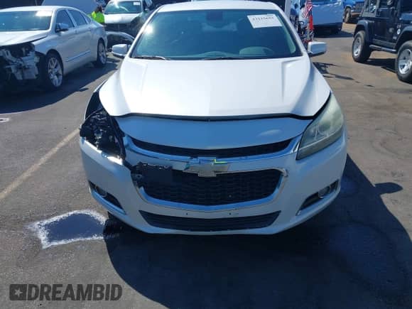 2015 Chevrolet Malibu LT z VIN 1G11D5SLXFF260725, wystawiony jako IAAI lot #43235655 z przebiegiem 217 363 mil mil oraz . Historia ofert i sprzedaży dostępna na DreamBid. Obrazek 12.