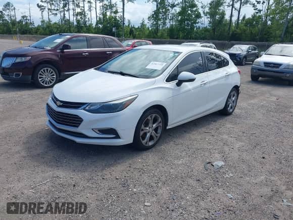 2017 Chevrolet Cruze Premier z VIN 3G1BF6SM8HS588110, wystawiony jako IAAI lot #42567710 z przebiegiem 116 173 mil mil oraz . Historia ofert i sprzedaży dostępna na DreamBid. Obrazek 2.