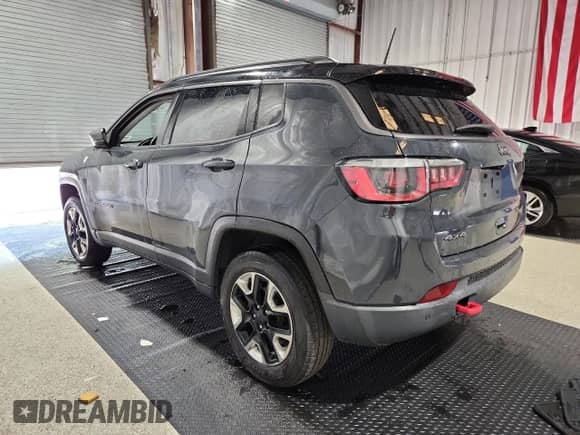 2018 Jeep Compass Trailhawk with VIN 3C4NJDDB8JT264061, listed as a Copart auction lot 68252765 with 69,347 mi miles and Clean title. Bid and sale history available at DreamBid. Image 2.