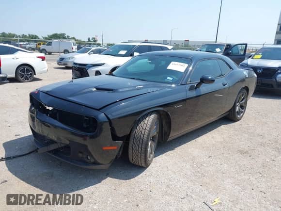 2015 Dodge Challenger R/T Plus с VIN 2C3CDZBT0FH892921, выставлен на аукционе IAAI как лот 43157502 с пробегом 138 404 миль миль и . История ставок и продаж доступна на DreamBid. Изображение 17.