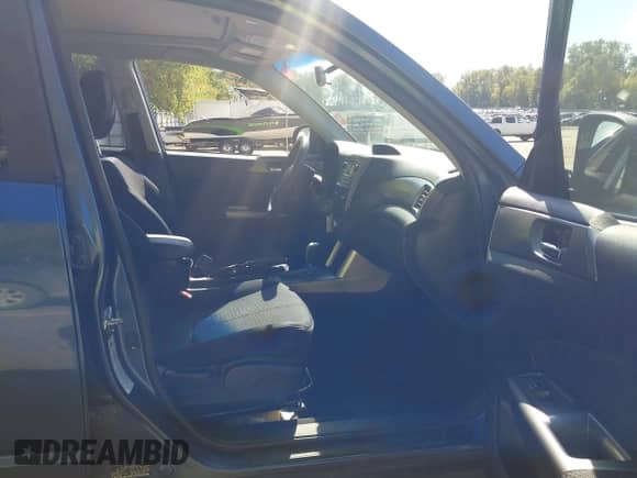 2012 Subaru Forester X Premium z VIN JF2SHACC8CH466036, wystawiony jako IAAI lot #43352225 z przebiegiem 153 270 mil mil oraz . Historia ofert i sprzedaży dostępna na DreamBid. Obrazek 5.