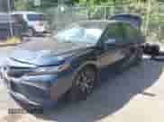 2021 Toyota Camry SE Nightshade z VIN 4T1G11AKXMU523439, wystawiony jako IAAI lot #43122074 z przebiegiem 66 261 mil mil oraz . Historia ofert i sprzedaży dostępna na DreamBid. Obrazek 2.